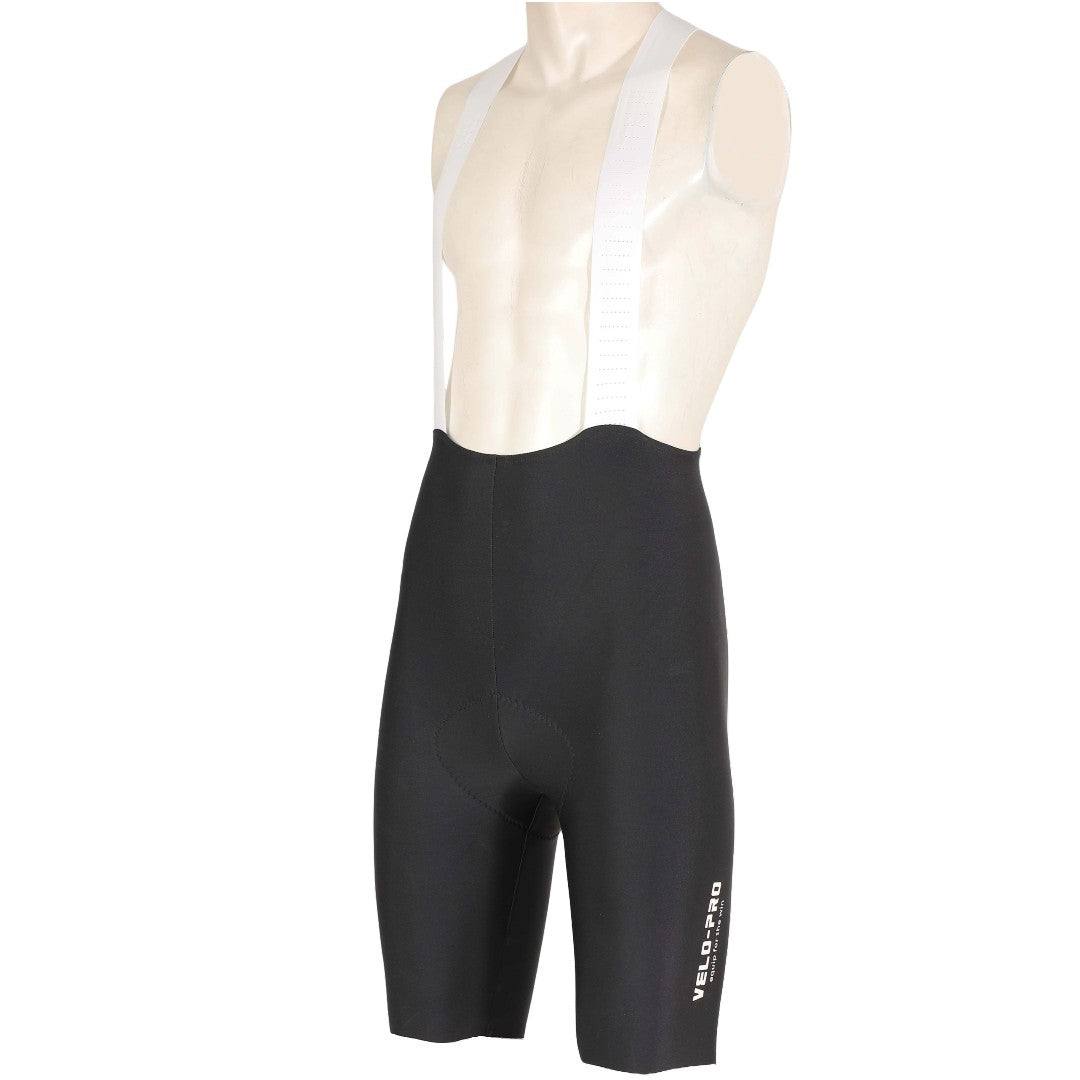 Black cycling bib shorts with white mesh liner on a mannequin against a white background
