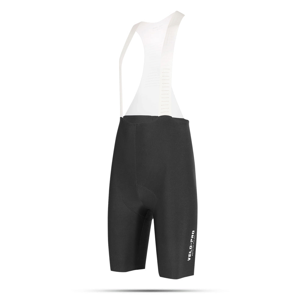 Black cycling bib shorts with white top on a white background